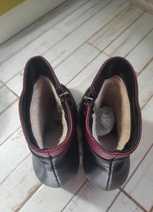 Зимние ботинки на каблуке3 фото