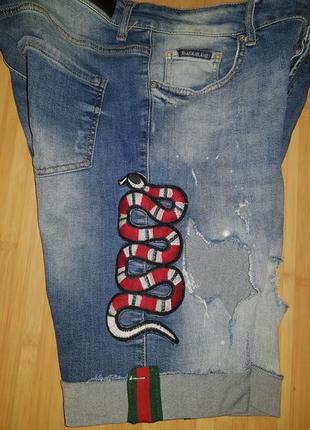Стильные  джинсовые  шорты, рваные, размер 48,506 фото