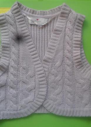В'язана жилетка