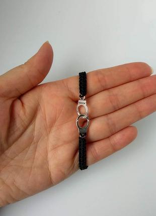 Браслет на руку чорний наручники