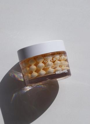 Антивозрастной капсульный крем с экстрактом золотого шелкопряда medi-peel gold age tox cream, 50 мл