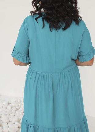 Батальное женское голубое платье трапеция с карманами по боках 48-565 фото