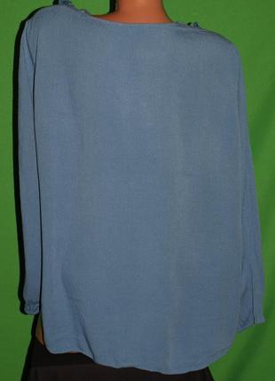 Шикраная блуза (3-4хл замеры) цвет небесный ,натур. состав со шнуровкой и бахромой.3 фото