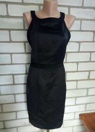 Сукню коктельное сарафан з оригінальною спинкою.