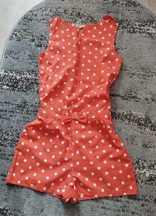 Яскравий ромпер в горошок