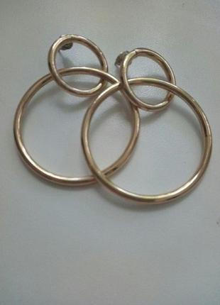 Cерьги -  кольца золотистого цвета2 фото