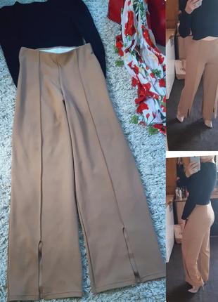 Стильные широкие штаны с разрезами,  р. 10-121 фото