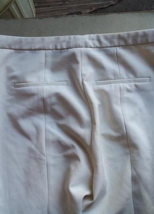 Белые  облегающие брюки6 фото