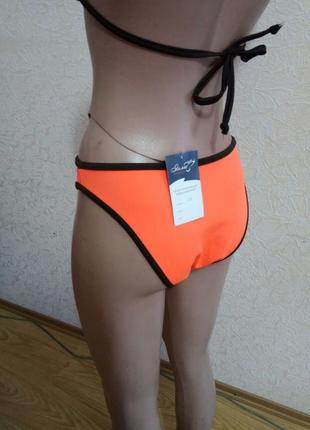 Спортивный купальник оранжевого цвета2 фото