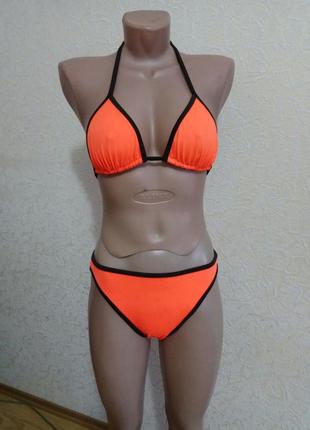 Спортивный купальник оранжевого цвета3 фото