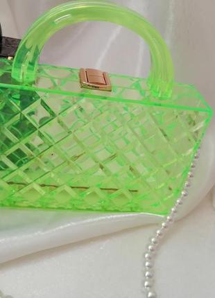 Розпродаж сумка клатч прозора з пластику пройшов затікання що є невеликий дефект в самому пластику у