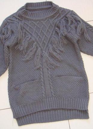 Модний светр з бахромою
