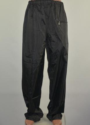 Плотные влагозащитные штаны trouser outdoor (m) складываются в карман.1 фото