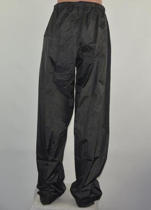 Плотные влагозащитные штаны trouser outdoor (m) складываются в карман.3 фото