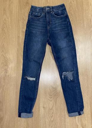 Жіночі джинси жіночі темно сині джинси рванки1 фото