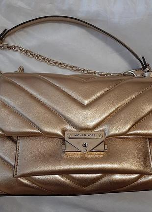 Сумка золотиста michael kors5 фото
