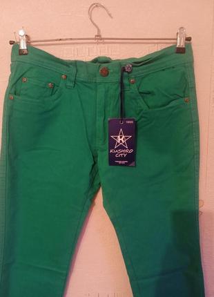 Класические зелёные джинсы2 фото