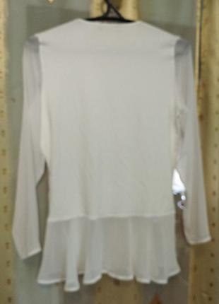 Блуза жіноча білого кольору.2 фото