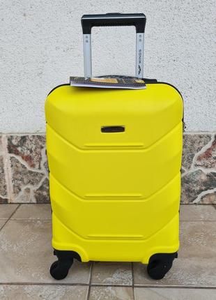 Яскравий надійні дорожній чемодан wings 147 жовтий8 фото