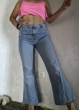 Штани кльош bershka