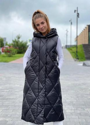 Жіноча чорна жилетка довга безрукавка з поясом стьогана