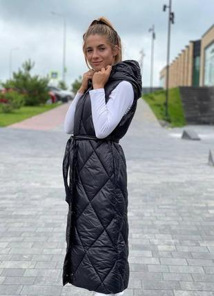 Жіноча чорна жилетка довга безрукавка з поясом стьогана