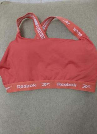 !жіночий топ для занять спортом бренду reebok.