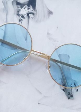 Круглі окуляри з кольоровою лінзою блакитний