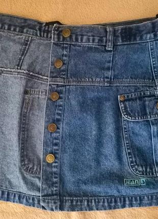 Класна коротка джинсова спідничка з ґудзиками спереду4 фото