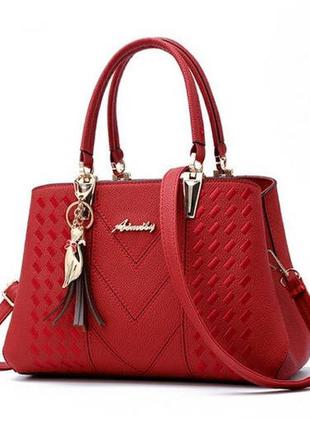 Модна жіноча сумочка з брелком. жіноча сумка з плечовим ременем для жінок червона8 фото