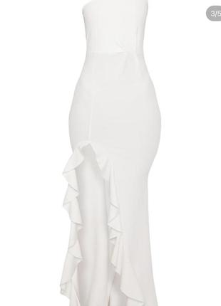 Біле довге плаття з розрізом на одне плече3 фото