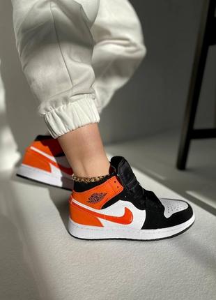 Жіночі кросівки nike air jordan 1 mid black orange 36-38-39-405 фото