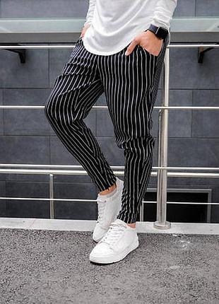 Чоловічі штани в смужку
