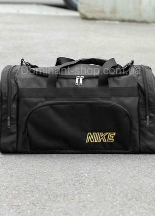 Большая дорожная спортивная сумка nike biz yellow черная тканевая на 60 литров для путешествий командировок7 фото