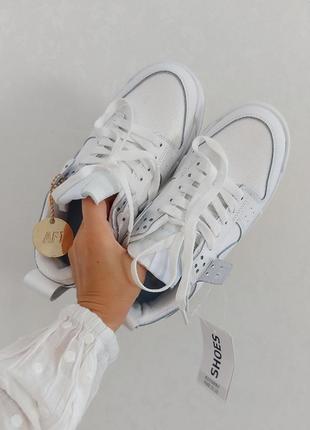 Білі, шкіряні жіночі кросівки nike dunk low disrupt white5 фото