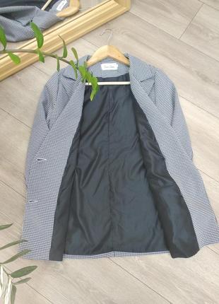Трендовий базовий брючний оверсайз костюм у дрібну клітинку з двухбортним жакетом з прямими штанами колір білий чорний розмір s m4 фото