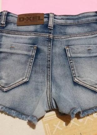 Рванные джинсовые шорты с высокой посадкой3 фото