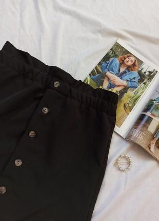 Чорна міні-спідниця на високій посадці з гудзиками2 фото
