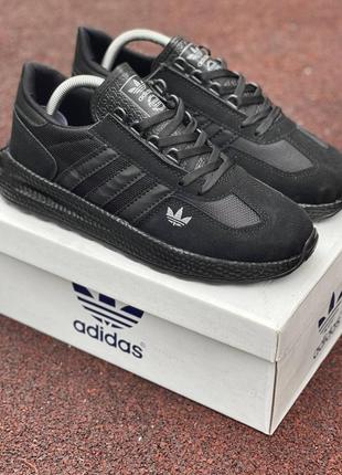 Кросівки adidas у чисто чорному кольорі7 фото