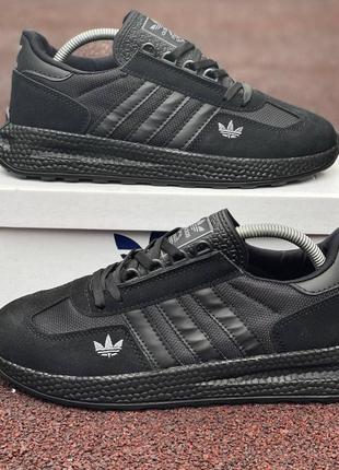 Кросівки adidas у чисто чорному кольорі8 фото