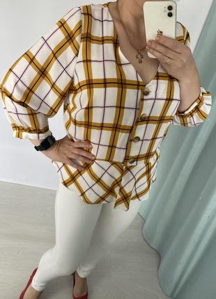 Блуза в клітинку