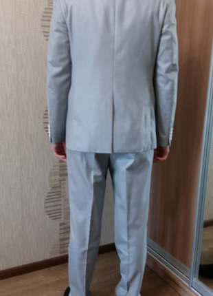Продам чоловічий костюм. світло-сірий. розмір 52.2 фото