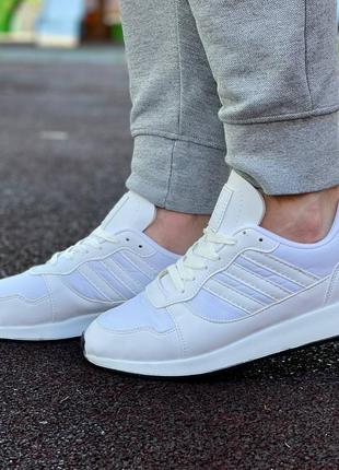 Неперевершені кросівки adidas у білому кольорі2 фото