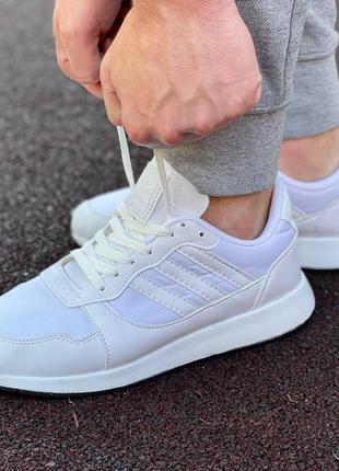 Неперевершені кросівки adidas у білому кольорі5 фото