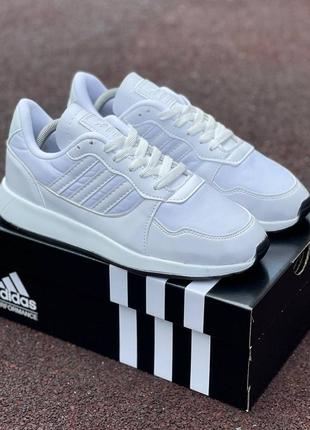 Неперевершені кросівки adidas у білому кольорі8 фото