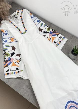 Сукня-вишиванка довжини міді з розпірками1 фото