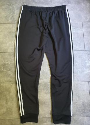 Чоловічі спортивні штани adidas gf0210, xl7 фото