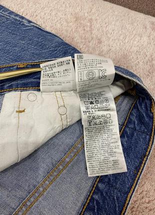 Класичні жіночі шорти 34 см з бахромою levi’s 5015 фото