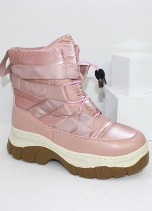 Дутіки черевики жіночі теплі в рожевому кольорі.4 фото