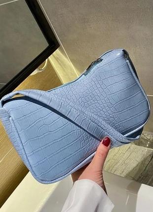 Голубая сумочка багет